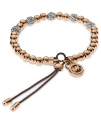 Add a little heat to your look. Michael Kors' stretchable bracelet combines rose-gold tone beads with pave crystal fireballs. Crafted in rose-gold tone mixed metal with an adjustable silk cord. Approximate diameter: 2-1/4 inches. Approximate width: 1/8 inch. Add a little heat to your look. Michael Kors' stretchable bracelet combines rose-gold tone beads with pave crystal fireballs. Crafted in rose-gold tone mixed metal with an adjustable silk cord. Approximate diameter: 2-1/4 inches. Approximate width: 1/8 inch.
