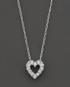 A beautiful diamond heart pendant in 14 Kt. white gold, with rope chain.
