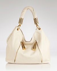 For the fashion-savvy, Michael Kors crafts this hobo in beyond-rich leather, detailed with embossed stingray. The effect is direct - and just so effortless. For the fashion-savvy, Michael Kors crafts this hobo in beyond-rich leather, detailed with embossed stingray. The effect is direct - and just so effortless.
