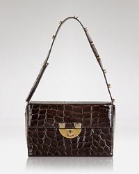 Gorgeous in glossy leather, this SONIA RYKIEL shoulder bag works a Left Bank vibe with its boxy shape and turnlock hardware. Carry it to infuse day-to-night looks with a poised, Parisian air. Gorgeous in glossy leather, this SONIA RYKIEL shoulder bag works a Left Bank vibe with its boxy shape and turnlock hardware. Carry it to infuse day-to-night looks with a poised, Parisian air.