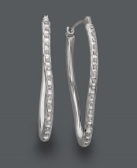 Add star-worthy style to your wardrobe. Sparkling hoops features a unique twisted design accented by round-cut diamonds. Crafted in 14k white gold. Approximate diameter: 1-1/4 inches. Add star-worthy style to your wardrobe. Sparkling hoops features a unique twisted design accented by round-cut diamonds. Crafted in 14k white gold. Approximate diameter: 1-1/4 inches.