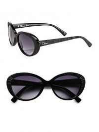 A retro cat's-eye frame is given an ultra-cool update in textured acetate with logo temples. Available in black with violet gradient lens.Logo temples100% UV protectionMade in Italy A retro cat's-eye frame is given an ultra-cool update in textured acetate with logo temples. Available in black with violet gradient lens.Logo temples100% UV protectionMade in Italy