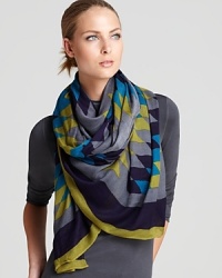 With oversized dimensions and a super-soft fabrication, this geometric-print scarf from Theodora & Callum is perfect for work, play and everything in between. With oversized dimensions and a super-soft fabrication, this geometric-print scarf from Theodora & Callum is perfect for work, play and everything in between.