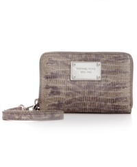 Add some exotic attitude to your round-the-clock wardrobe with this python-embossed design from MICHAEL Michael Kors. The pocket-lined interior stashes phone, cards, cash and ID for all your day-to-night dalliances. Add some exotic attitude to your round-the-clock wardrobe with this python-embossed design from MICHAEL Michael Kors. The pocket-lined interior stashes phone, cards, cash and ID for all your day-to-night dalliances.