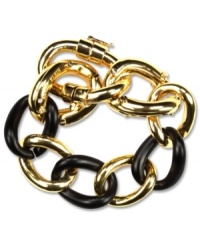 A versatile choice for mixing and matching. Jet black links combine with gold tone mixed metal details on this Anne Klein flex bracelet. Approximate length: 7-1/2 inches. A versatile choice for mixing and matching. Jet black links combine with gold tone mixed metal details on this Anne Klein flex bracelet. Approximate length: 7-1/2 inches.