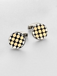 A handsome pair of sterling silver and 18kt-gold cuff links instantly adds modern artistry to your standard dress wardrobe.Sterling silver/18kt GoldAbout ¾ diam.Made in the United Kingdom A handsome pair of sterling silver and 18kt-gold cuff links instantly adds modern artistry to your standard dress wardrobe.Sterling silver/18kt GoldAbout ¾ diam.Made in the United Kingdom