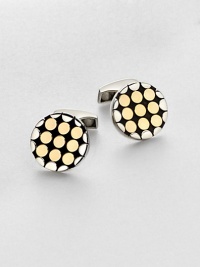 A handsome pair of sterling silver and 18kt-gold cuff links instantly adds modern artistry to your standard dress wardrobe.Sterling silver/18kt GoldAbout ¾ diam.Made in the United Kingdom