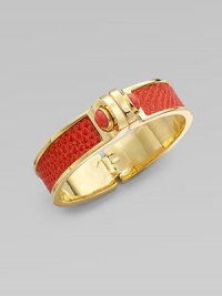 This chic style boasts boldly colored, glitter lizard skin inlay with pretty, coral stone accents set in 14k goldplating. Glitter lizard skinReconstituted coral14k goldplated white metal alloyDiameter, about 2¼Hinged closureMade in USA This chic style boasts boldly colored, glitter lizard skin inlay with pretty, coral stone accents set in 14k goldplating. Glitter lizard skinReconstituted coral14k goldplated white metal alloyDiameter, about 2¼Hinged closureMade in USA