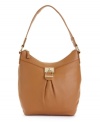 Luxe leather and polished accents give this Calvin Klein design a timelessly posh appeal. Classic signature hardware decorates this easy-going hobo silhouette for the perfect everyday style.
