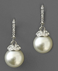 Dress up with old-world glamour. These Givenchy glass pearl earrings feature crystal accents set in silvertone mixed metal. Approximate drop: 1-1/2 inches.