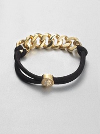A combination of shiny metal and sporty elastic accented with a turn-lock logo bead. Goldtone-plated brassElasticLength, about 6.2Slip-on styleImported A combination of shiny metal and sporty elastic accented with a turn-lock logo bead. Goldtone-plated brassElasticLength, about 6.2Slip-on styleImported