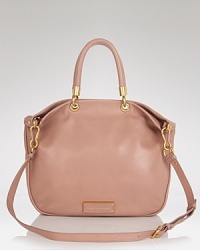 We love the always-chic ease of this leather MARC BY MARC JACOBS satchel. Like the best arm candy, it looks good with everything. We love the always-chic ease of this leather MARC BY MARC JACOBS satchel. Like the best arm candy, it looks good with everything.