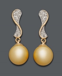 Elegance redefined by polish and shine. These unique wave-shaped drops feature cultured Golden South Sea pearls (10-11 mm) and sparkling, round-cut diamonds (1/4 ct. t.w.). Setting crafted in 14k gold. Approximate drop: 1-1/4 inches.