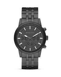 Hard-hitting and handsome, this Michael Kors watch puts a luxury spin on surplus style, crafted from stainless steel. Hard-hitting and handsome, this Michael Kors watch puts a luxury spin on surplus style, crafted from stainless steel.