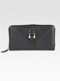 Zip around buffalo leather long wallet. Golden hardware Top zip closure 12 credit card slots 2 bill slots One inside top zip pocket Leather lining 7½W X 4½H X 1D Made in Italy Zip around buffalo leather long wallet. Golden hardware Top zip closure 12 credit card slots 2 bill slots One inside top zip pocket Leather lining 7½W X 4½H X 1D Made in Italy