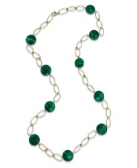 Easy on the eyes. A few precious malachite gems (12 mm) are scattered across an open 14k gold chain necklace, providing any outfit with a vibrant pop of green. Approximate length: 28 inches. Easy on the eyes. A few precious malachite gems (12 mm) are scattered across an open 14k gold chain necklace, providing any outfit with a vibrant pop of green. Approximate length: 28 inches.