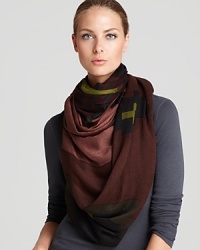 While the print and colors are desert inspired, this oversized Theodora & Callum scarf is all-essential for cooler days on both coasts. While the print and colors are desert inspired, this oversized Theodora & Callum scarf is all-essential for cooler days on both coasts.
