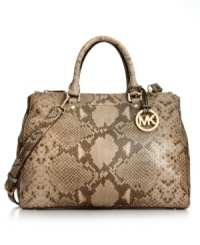 Flaunt your fierce factor with this posh python-embossed design from MICHAEL Michael Kors. Crafted from the softest leather with posh golden hardware, it's easy to see how this silhouette adds allure to any ensemble. Flaunt your fierce factor with this posh python-embossed design from MICHAEL Michael Kors. Crafted from the softest leather with posh golden hardware, it's easy to see how this silhouette adds allure to any ensemble.