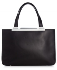 Polished and practical with lady-like charm, this take-anywhere tote from MICHAEL Michael Kors is an everyday essential. Luxurious leather is accented with sleek, silver-tone hardware, while the interior is outfitted with plenty of pockets and compartments for all the essentials. Polished and practical with lady-like charm, this take-anywhere tote from MICHAEL Michael Kors is an everyday essential. Luxurious leather is accented with sleek, silver-tone hardware, while the interior is outfitted with plenty of pockets and compartments for all the essentials.