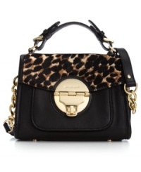 Master mixed media accessorizing with this chic satchel from MICHAEL Michael Kors. Signature golden hardware adorn the sumptuous leather accented with leopard haircalf trim, making this silhouette effortlessly exotic. Master mixed media accessorizing with this chic satchel from MICHAEL Michael Kors. Signature golden hardware adorn the sumptuous leather accented with leopard haircalf trim, making this silhouette effortlessly exotic.