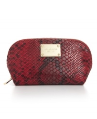 Revel in reptilian chic with this python-embossed cosmetic case from MICHAEL Michael Kors. Accented with signature detailing, it's sized-right to stow a bevy of beauty essentials. Revel in reptilian chic with this python-embossed cosmetic case from MICHAEL Michael Kors. Accented with signature detailing, it's sized-right to stow a bevy of beauty essentials.