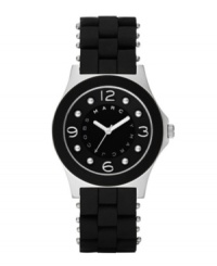 Wear it sporty or wear it stylishly: the Pelly watch by Marc by Marc Jacobs. Black silicone-wrapped stainless steel bracelet and round stainless steel case. Bezel with black silicone ring. Black dial features applied silvertone numerals at twelve, three, six and nine o'clock, dot markers, three silvertone hands and logo ring at inner dial. Quartz movement. Water resistant to 30 meters. Two-year limited warranty. Wear it sporty or wear it stylishly: the Pelly watch by Marc by Marc Jacobs. Black silicone-wrapped stainless steel bracelet and round stainless steel case. Bezel with black silicone ring. Black dial features applied silvertone numerals at twelve, three, six and nine o'clock, dot markers, three silvertone hands and logo ring at inner dial. Quartz movement. Water resistant to 30 meters. Two-year limited warranty.