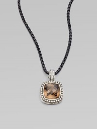 From the Moonlight Ice Collection. An enhancer of rich smokey quartz is surrounded by pavé diamonds.Diamonds, 0.45 tcw Smokey Quartz Sterling silver Enhancer width, about ½ ImportedPlease note: Chain sold separately. From the Moonlight Ice Collection. An enhancer of rich smokey quartz is surrounded by pavé diamonds.Diamonds, 0.45 tcw Smokey Quartz Sterling silver Enhancer width, about ½ ImportedPlease note: Chain sold separately.
