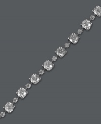 The perfect serve. EFFY Collection's stunning tennis bracelet features round-cut diamonds (3 ct. t.w.) in alternating large and small sizes. Crafted in 14k white gold. Approximate length: 7 inches. The perfect serve. EFFY Collection's stunning tennis bracelet features round-cut diamonds (3 ct. t.w.) in alternating large and small sizes. Crafted in 14k white gold. Approximate length: 7 inches.