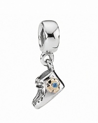 Commemorate a baby boy's first years with a sterling silver bootie charm with a blue zirconia stone accent in 14K gold. Commemorate a baby boy's first years with a sterling silver bootie charm with a blue zirconia stone accent in 14K gold.