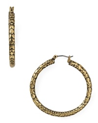 On-trend in textured metal. Slip on this pair of MARC BY MARC JACOBS hoop earrings to tip the style scales. On-trend in textured metal. Slip on this pair of MARC BY MARC JACOBS hoop earrings to tip the style scales.