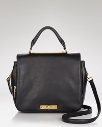 With its subtle structure, this leather MARC BY MARC JACOBS satchel is a timeless choice, detailed by a turnlock closure which opens to a well-organized interior. With its subtle structure, this leather MARC BY MARC JACOBS satchel is a timeless choice, detailed by a turnlock closure which opens to a well-organized interior.