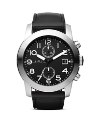 A handsome two-eye chronograph dial punctuates this military styled MARC BY MARC JACOBS watch, completed by a chic leather strap. A handsome two-eye chronograph dial punctuates this military styled MARC BY MARC JACOBS watch, completed by a chic leather strap.