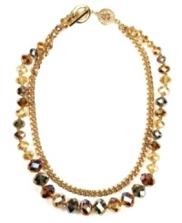 Add a splash of warm color this season. AK Anne Klein's double strand necklace incorporates smoky topaz-colored glass beads and gold tone chain detail secured by a toggle clasp. Crafted in gold tone mixed metal. Approximate length: 16 inches + 2-inch extender. Add a splash of warm color this season. AK Anne Klein's double strand necklace incorporates smoky topaz-colored glass beads and gold tone chain detail secured by a toggle clasp. Crafted in gold tone mixed metal. Approximate length: 16 inches + 2-inch extender.