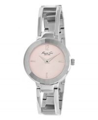Swooping lines and a ladylike pink dial define this darling watch from Kenneth Cole New York. Swooping lines and a ladylike pink dial define this darling watch from Kenneth Cole New York.