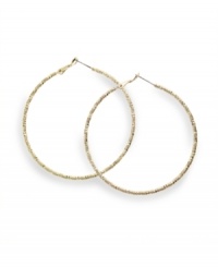 Go for the gold! Crafted in gold tone mixed metal, Alfani's classic hoop earrings get a design update with a stylish textured surface. Approximate diameter: 2-1/4 inches. Go for the gold! Crafted in gold tone mixed metal, Alfani's classic hoop earrings get a design update with a stylish textured surface. Approximate diameter: 2-1/4 inches.