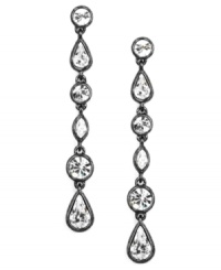 Lengthen your sophisticated look. Givenchy's light hematite-plated mixed metal earrings feature stunning crystal glass stones. Approximate drop: 3-3/4 inches. Lengthen your sophisticated look. Givenchy's light hematite-plated mixed metal earrings feature stunning crystal glass stones. Approximate drop: 3-3/4 inches.