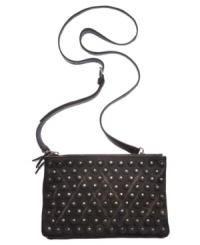 Get your groove on with this rocker-chic inspired design from Frye. Stud accents add dimension and detail, while the roomy interior offers triple zip compartments for exquisite organization. Get your groove on with this rocker-chic inspired design from Frye. Stud accents add dimension and detail, while the roomy interior offers triple zip compartments for exquisite organization.