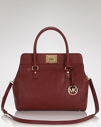 Carry effortless glamor with this leather day bag from MICHAEL Michael Kors. Crafted of rich leather this striking satchel flaunts versatile style, with its handle to crossbody design. Carry effortless glamor with this leather day bag from MICHAEL Michael Kors. Crafted of rich leather this striking satchel flaunts versatile style, with its handle to crossbody design.