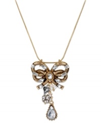 A vintage-inspired style your grandmother would love. This pendant necklace from Betsey Johnson features a bow encrusted with crystal accents, a crystal teardrop, crystal fireball and silver tone bubble heart. Crafted in antiqued gold tone mixed metal. Approximate length: 16 inches + 3-inch extender. Approximate drop: 2 inches. A vintage-inspired style your grandmother would love. This pendant necklace from Betsey Johnson features a bow encrusted with crystal accents, a crystal teardrop, crystal fireball and silver tone bubble heart. Crafted in antiqued gold tone mixed metal. Approximate length: 16 inches + 3-inch extender. Approximate drop: 2 inches.