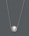 Round out your look with smooth curves. This versatile and polished pendant highlights a shiny bead slide (8 mm) strung from a delicate chain. Crafted in sterling silver. Approximate length: 18 inches.