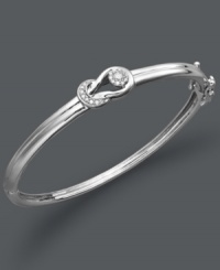 Sophisticated sparkle that's eternally stylish. Everlon's chic, knotted bangle features a smooth, sterling silver setting that cradles gleaming, round-cut diamonds (1/4 ct. t.w.). Approximate diameter: 2-1/2 inches. Sophisticated sparkle that's eternally stylish. Everlon's chic, knotted bangle features a smooth, sterling silver setting that cradles gleaming, round-cut diamonds (1/4 ct. t.w.). Approximate diameter: 2-1/2 inches.