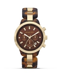 Tap this season's tortoise shell trend with this watch from MICHAEL Michael Kors. It's tonal face and bold bracelet perfect jet set chic, so wear it to give looks first class attitude. Tap this season's tortoise shell trend with this watch from MICHAEL Michael Kors. It's tonal face and bold bracelet perfect jet set chic, so wear it to give looks first class attitude.