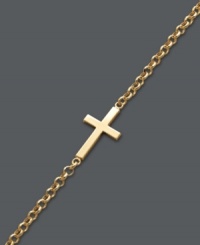 Stay true to your faith. Studio Silver's adds a simple twist on a traditional cross design by flipping it on its side. This delicate style can be worn alone to make a symbolic statement, or paired with other designs for a trendy layered effect. Bracelet crafted in 18k gold over sterling silver. Approximate length: 7-1/4 inches.