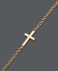 Stay true to your faith. Studio Silver's adds a simple twist on a traditional cross design by flipping it on its side. This delicate style can be worn alone to make a symbolic statement, or paired with other designs for a trendy layered effect. Bracelet crafted in 18k gold over sterling silver. Approximate length: 7-1/4 inches. Stay true to your faith. Studio Silver's adds a simple twist on a traditional cross design by flipping it on its side. This delicate style can be worn alone to make a symbolic statement, or paired with other designs for a trendy layered effect. Bracelet crafted in 18k gold over sterling silver. Approximate length: 7-1/4 inches.