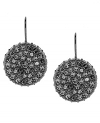 Filled with sophisticated intrigue, these Vince Camuto earrings feature black pave stones on drop discs. Crafted in hematite-plated mixed metal. Approximate drop: 1-1/4 inches.