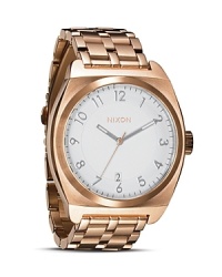 Be fashionably on time. With chunky-chic gold bracelet, Nixon's classically styled chronograph makes a handsome complement to this season's boy-borrowed looks. Be fashionably on time. With chunky-chic gold bracelet, Nixon's classically styled chronograph makes a handsome complement to this season's boy-borrowed looks.