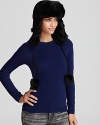 It doesn't get warmer than this earflap hat from Surell, done up with plush rabbit fur for a luxurious winter look.