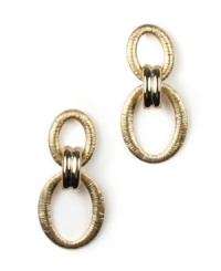 Say yes to 80s-inspired style! Jones New York revives a vintage door knocker design with a modern twist. Crafted in worn gold tone mixed metal. Approximate drop: 1-3/4 inches. Say yes to 80s-inspired style! Jones New York revives a vintage door knocker design with a modern twist. Crafted in worn gold tone mixed metal. Approximate drop: 1-3/4 inches.