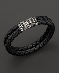 A bold mix of intricately detailed sterling silver and braided leather from the John Hardy Dot Collection. A bold mix of intricately detailed sterling silver and braided leather from the John Hardy Dot Collection.