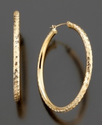 Diamond-cut 14k gold adds a fun, textured twist to these classic hoop earrings. Approximate diameter: 1-1/2 inches. Diamond-cut 14k gold adds a fun, textured twist to these classic hoop earrings. Approximate diameter: 1-1/2 inches.